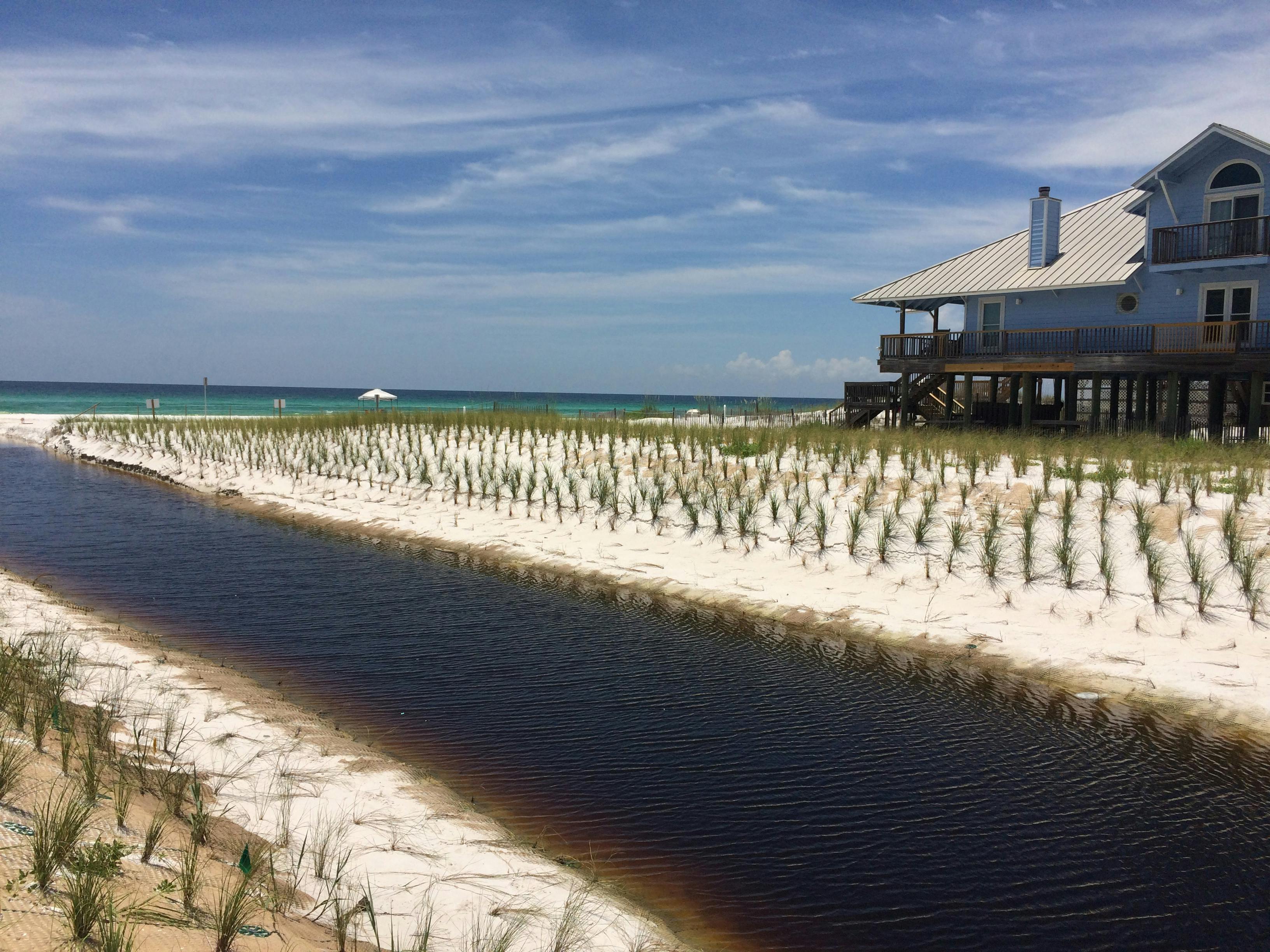 Oyster Lake's outfall, strained by storms and urban growth, was reinforced using PROPEX Armormax for erosion control. It withstood Hurricane Michael, protecting the area.