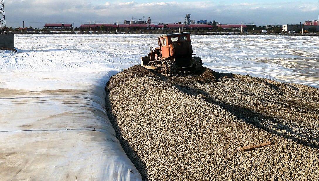 Closing sludge ponds effectively involves using geotextile reinforcement to handle the low bearing capacity of sludge, ensuring structural stability and environmental safety. This method includes detailed site assessments and custom engineering solutions.