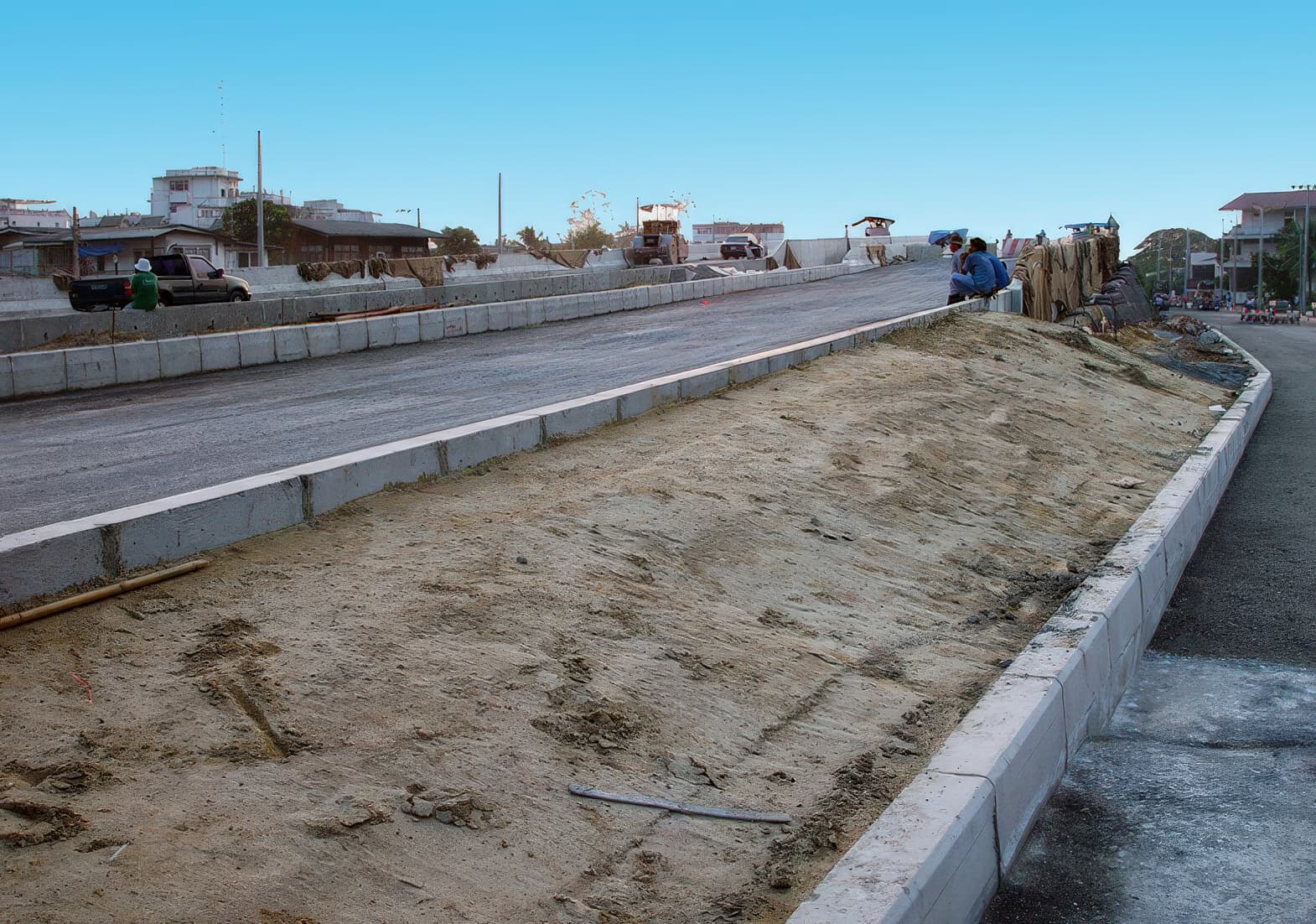 Pile-supported embankments built with concrete piles, caps, and beams over soft Bangkok clay.