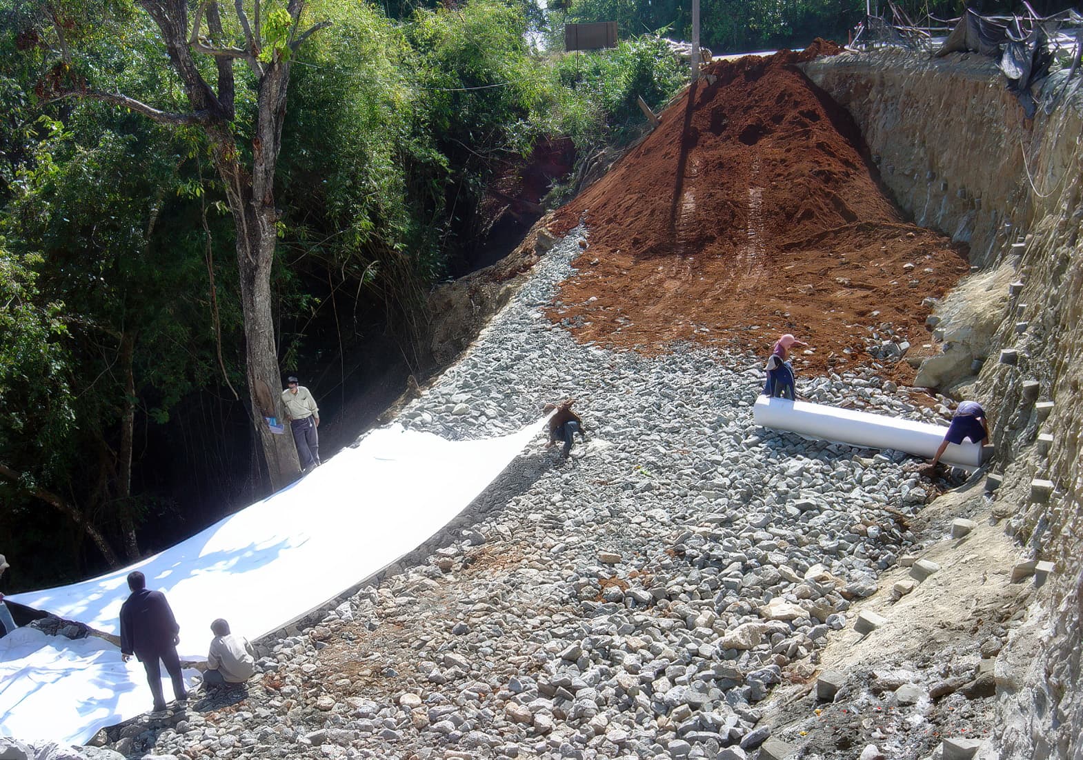 Placement of stone drainage blanket-MIRAFI on top