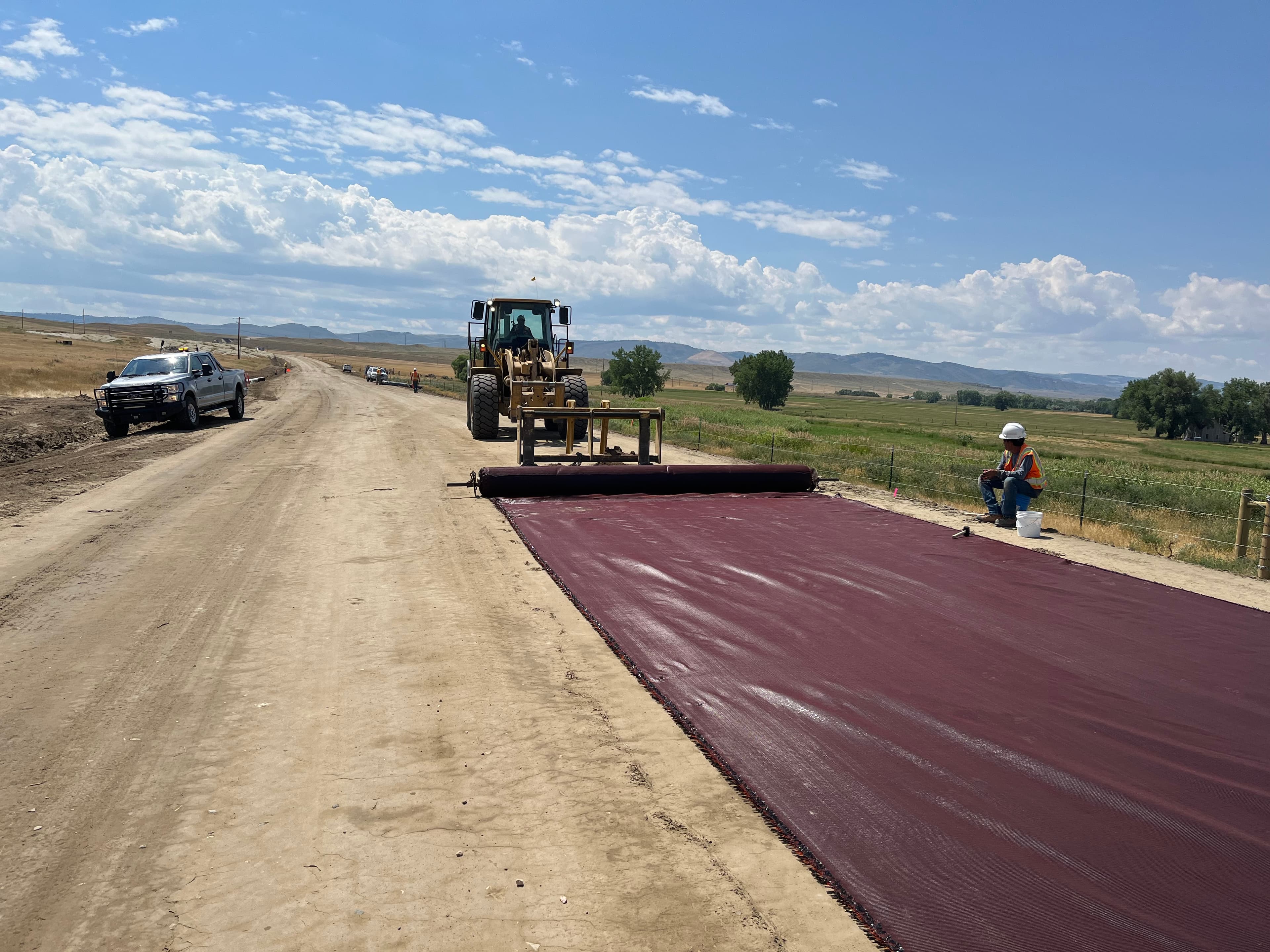 Workers installed 30,000 yd² of MIRAFI RS380i to stabilize Mormon Canyon Road in Converse County, WY.