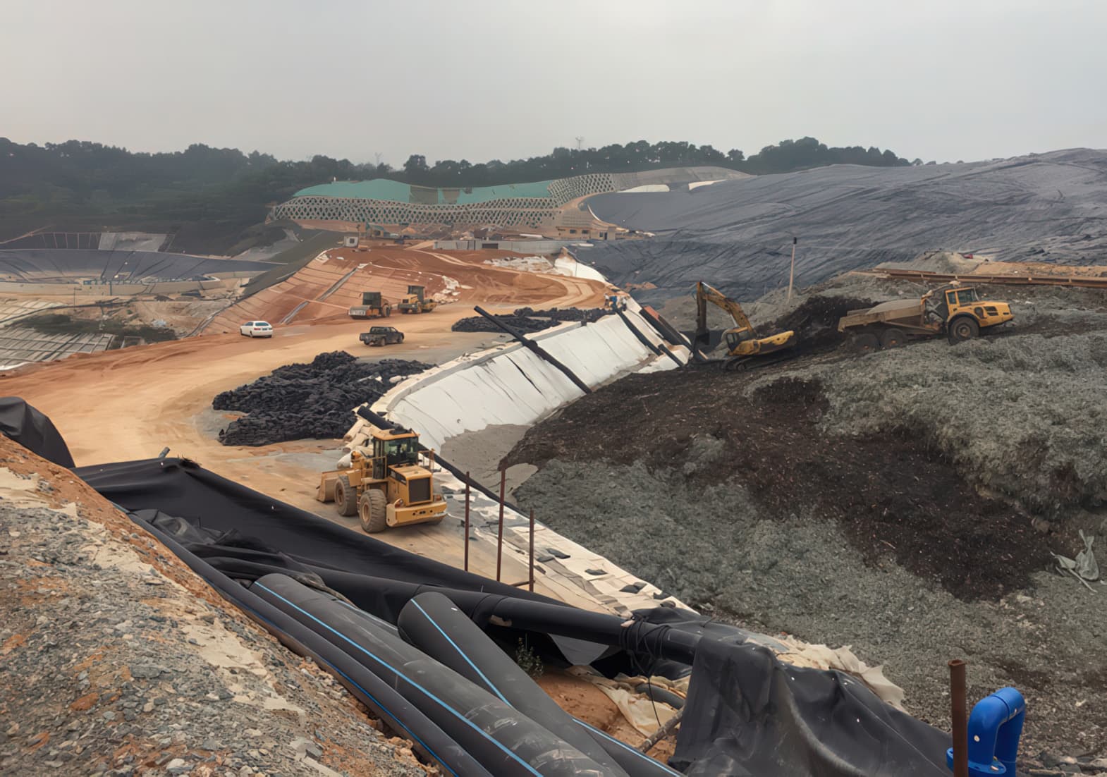 Geomembrane barrier installed on MSE bund’s inner side