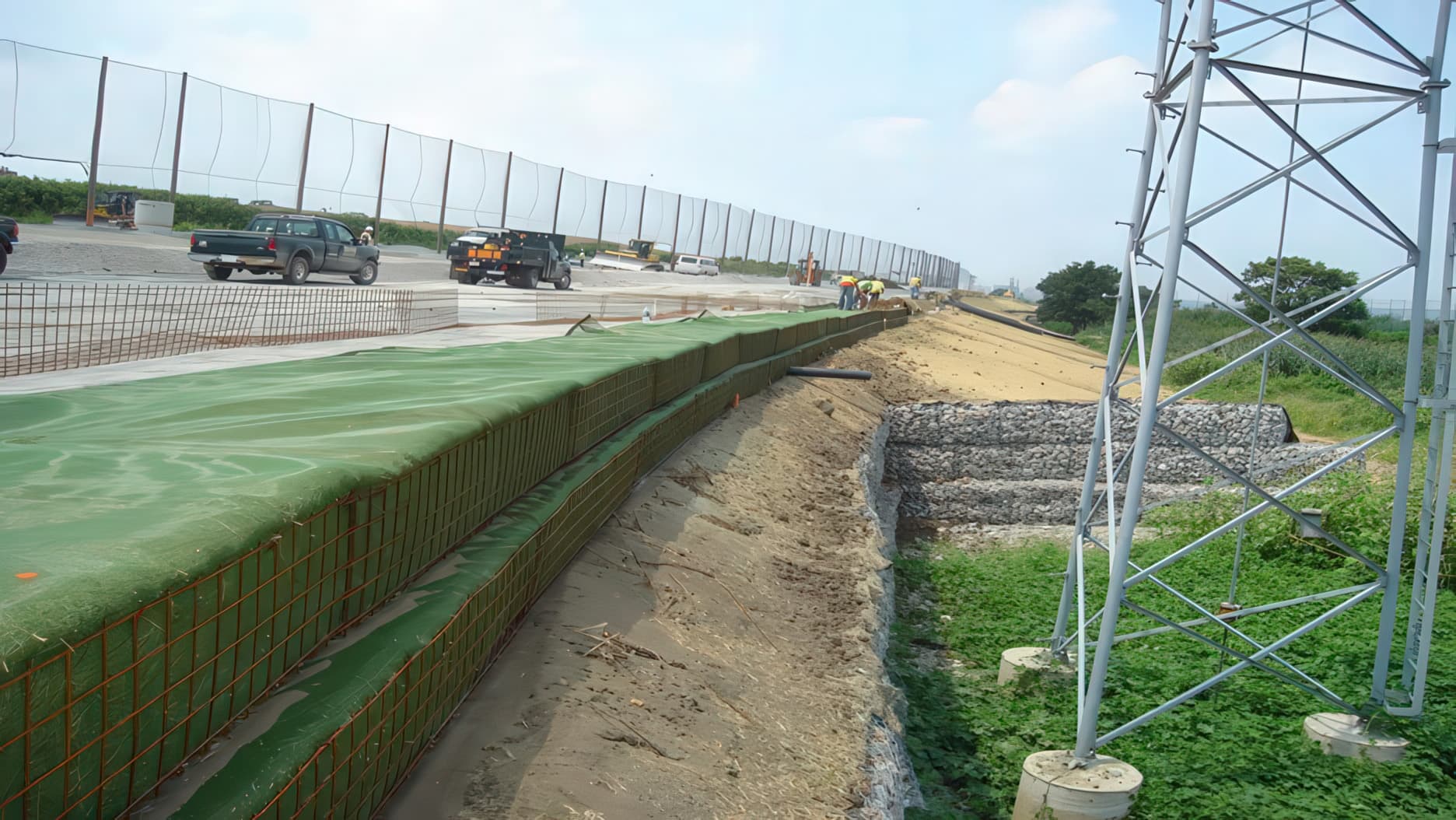 Mid-construction berm slope cross-section.