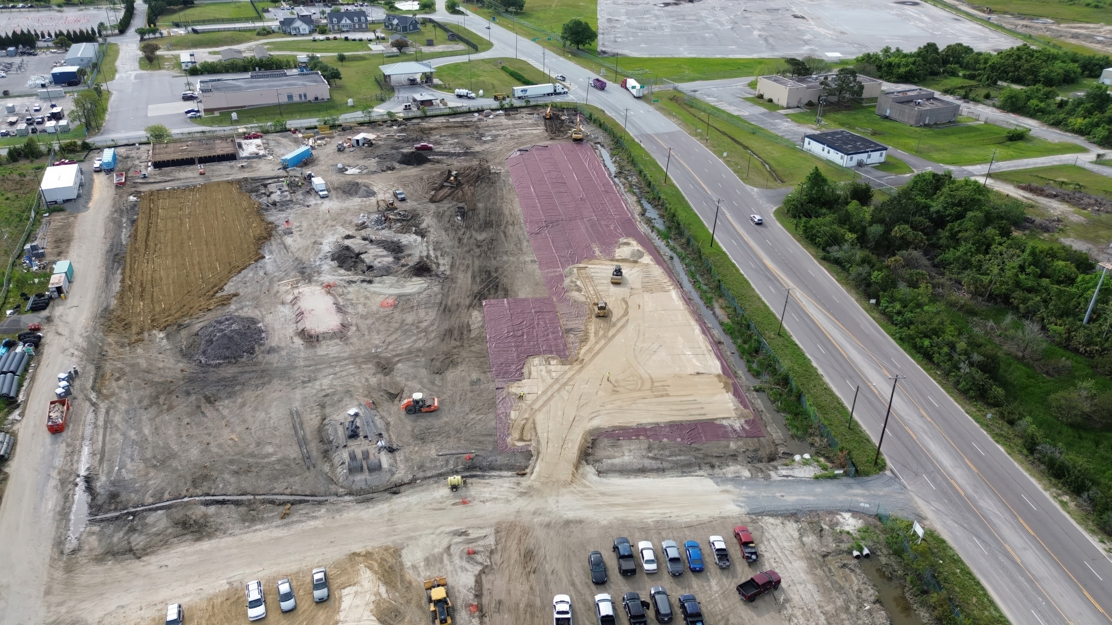 Factory-sewn panels combined multiple rolls into wider sections, reducing overlap requirements, material waste, and installation time on site.