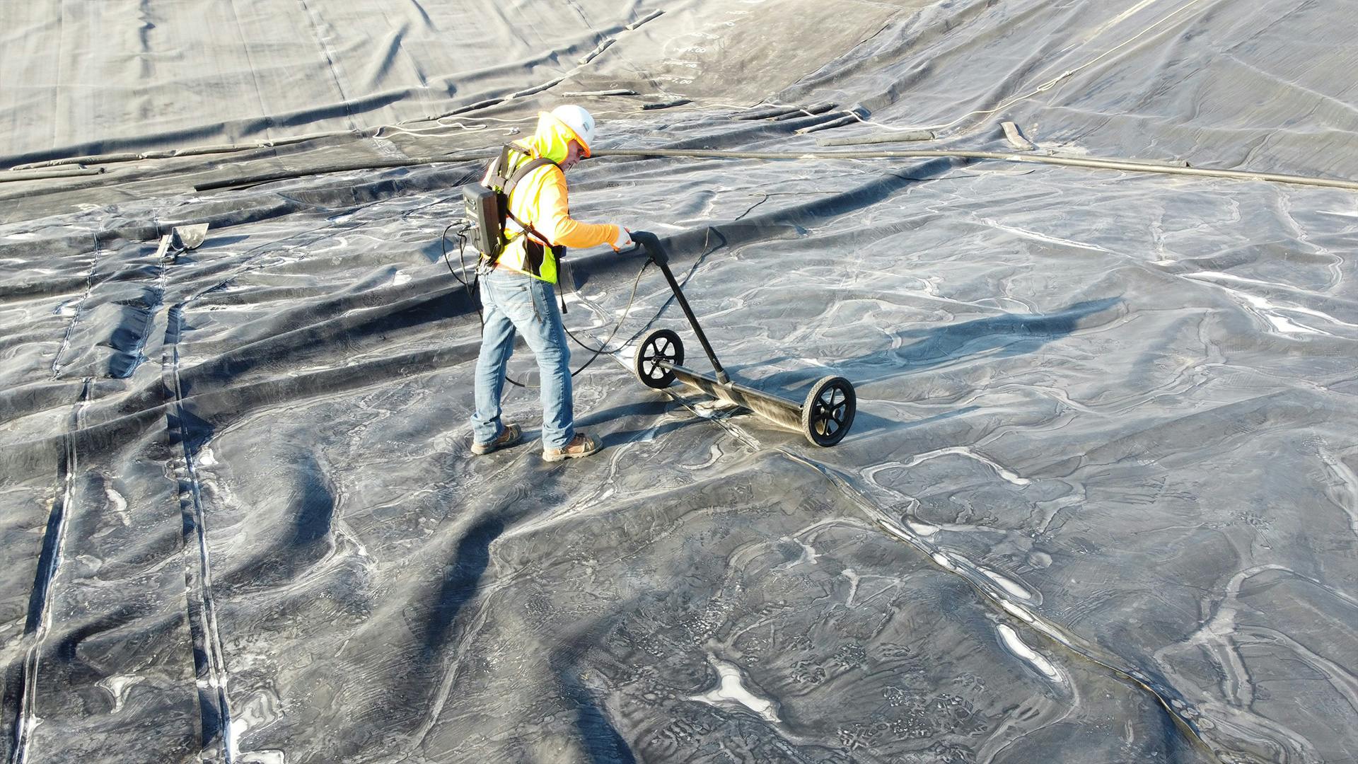 The S-100 spark tester conforms to wrinkles to make intimate contact between the geomembrane and conductive substrate, providing more accurate leak detection than traditional ELL surveys.