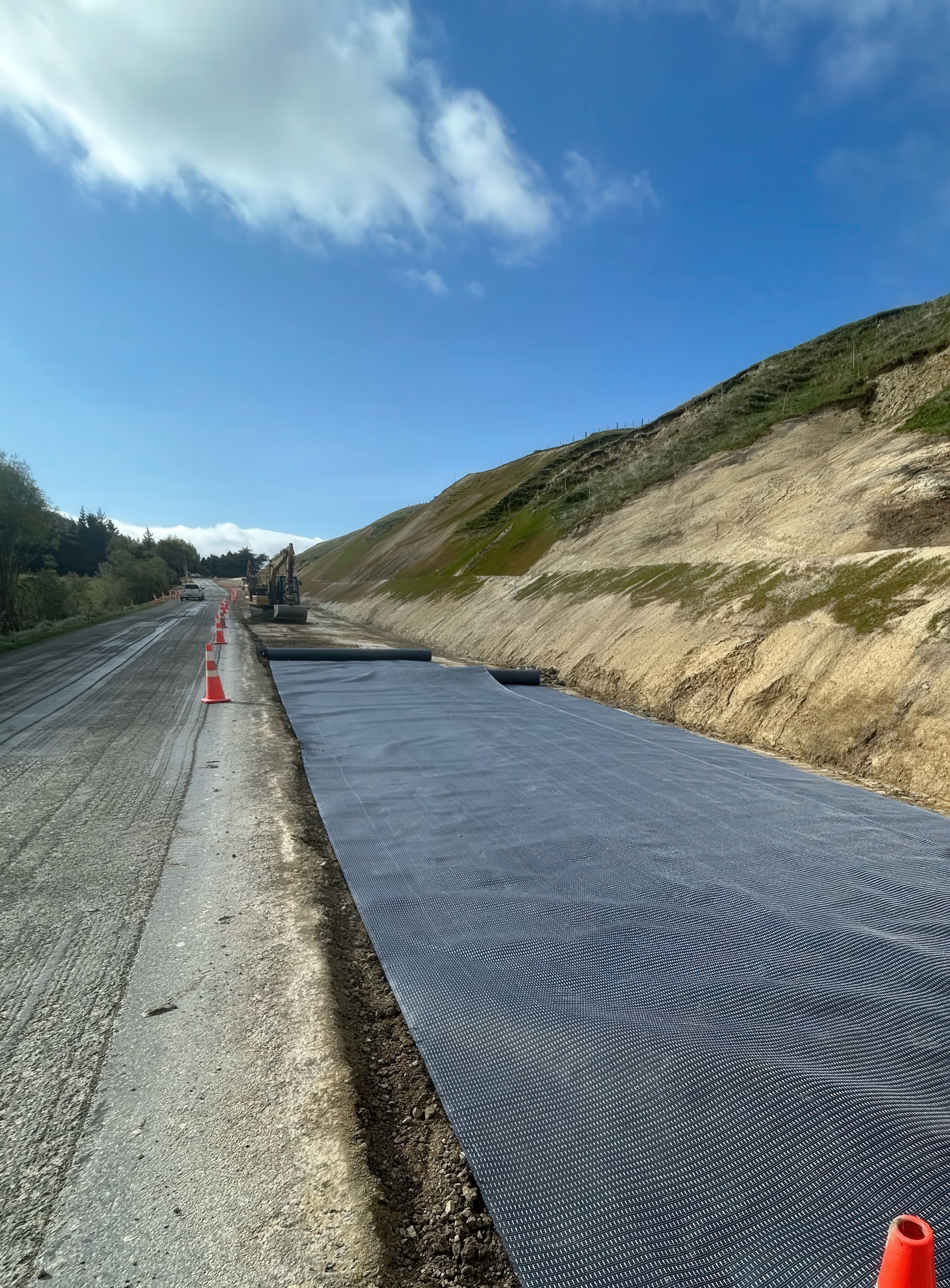 Light grading prepared the subgrade surface while avoiding heavy equipment to limit disturbance of the soft, moisture-sensitive soils.
© Geofabrics