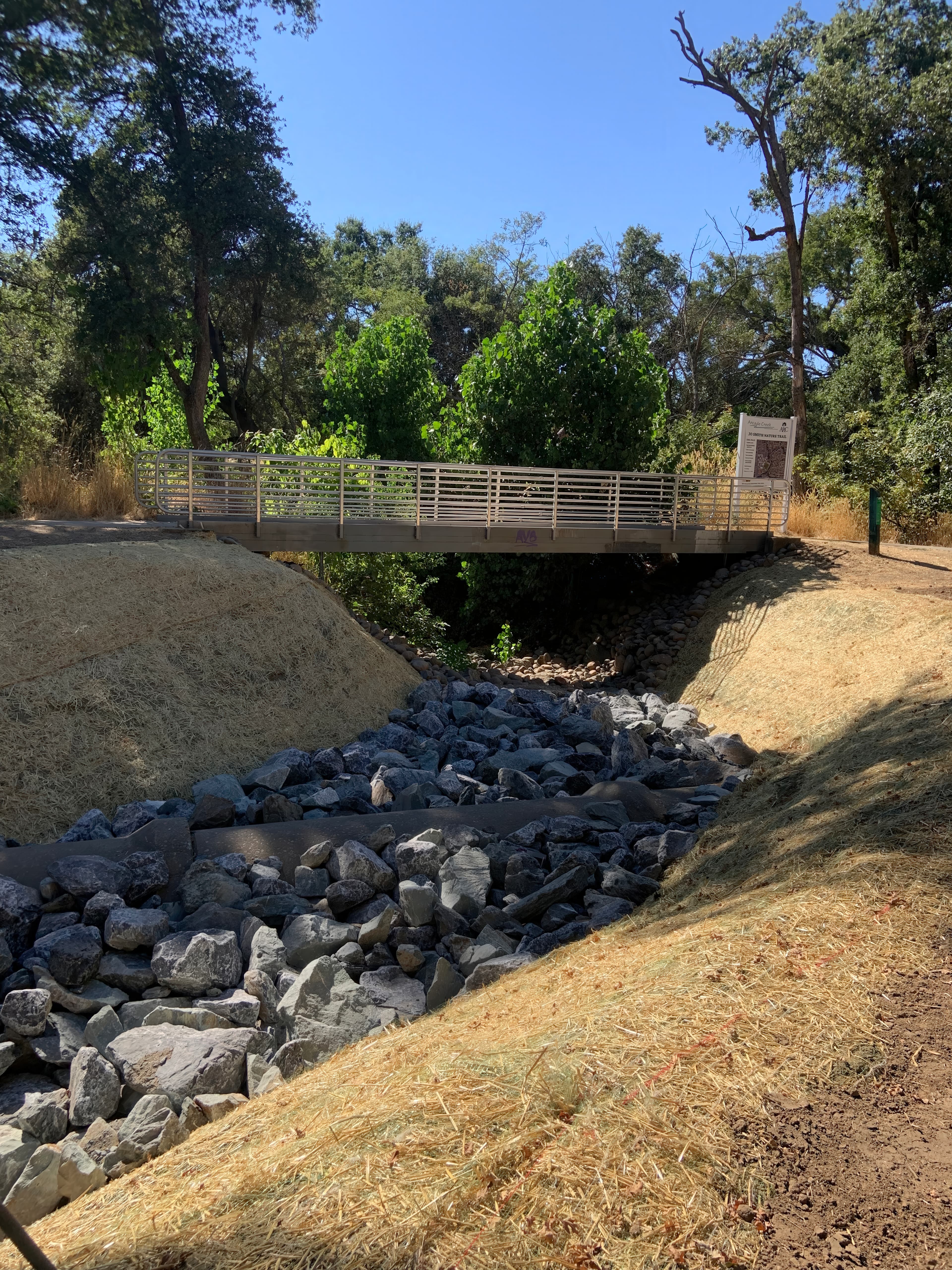 PROPEX Armormax reinforcing an over-steepened creek bank (>1:1) to provide long-term stability in an area with limited access for heavy equipment.