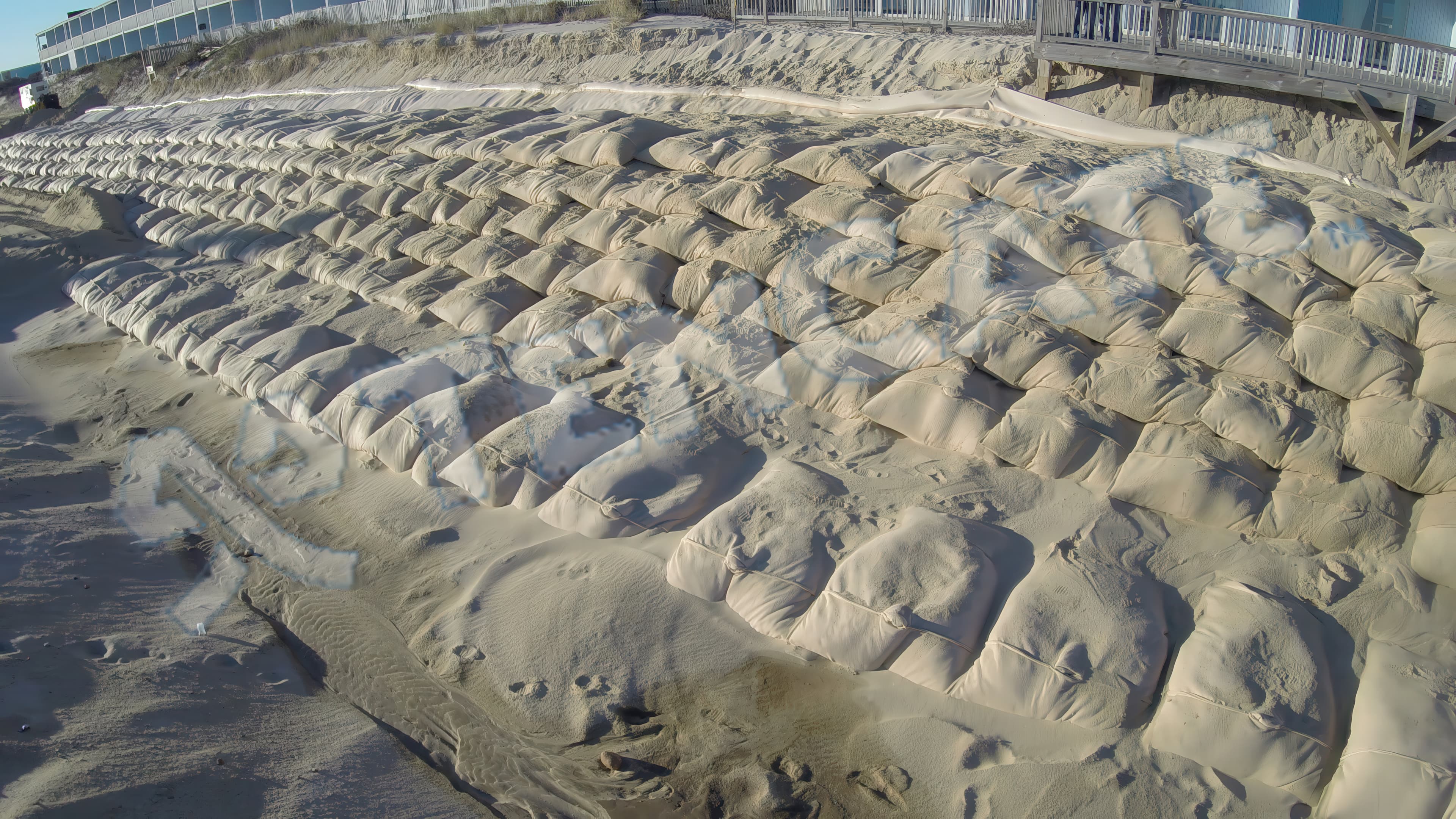 More than 11,000 GEOTUBE Geobag sand containers and 3,200 ft of scour aprons were deployed over a three-month construction period.