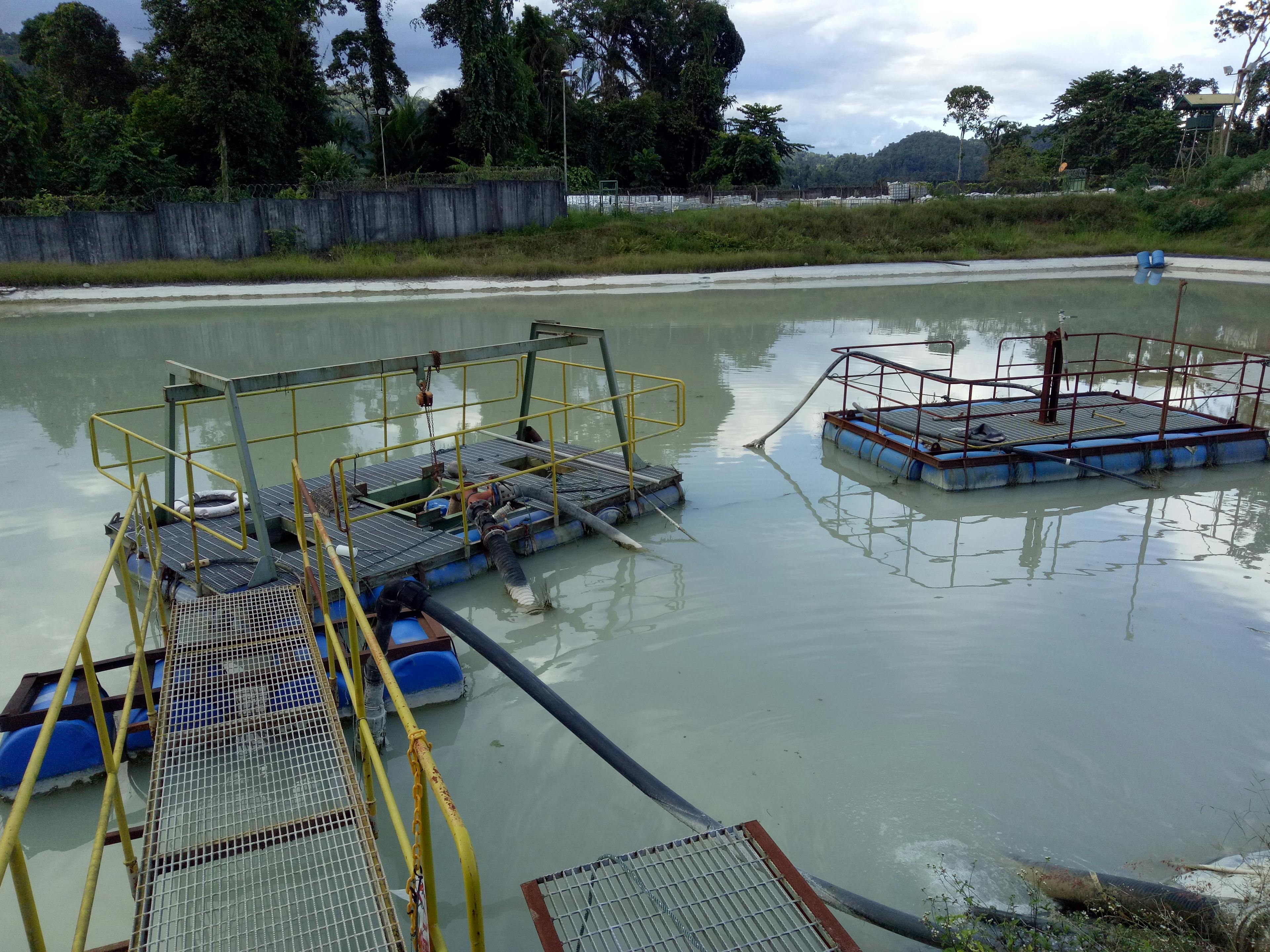 A remote gold mine located on an Indonesian island required the dredging of heavily silted settling ponds. These ponds contained valuable gold deposits that needed to be recovered and reprocessed.