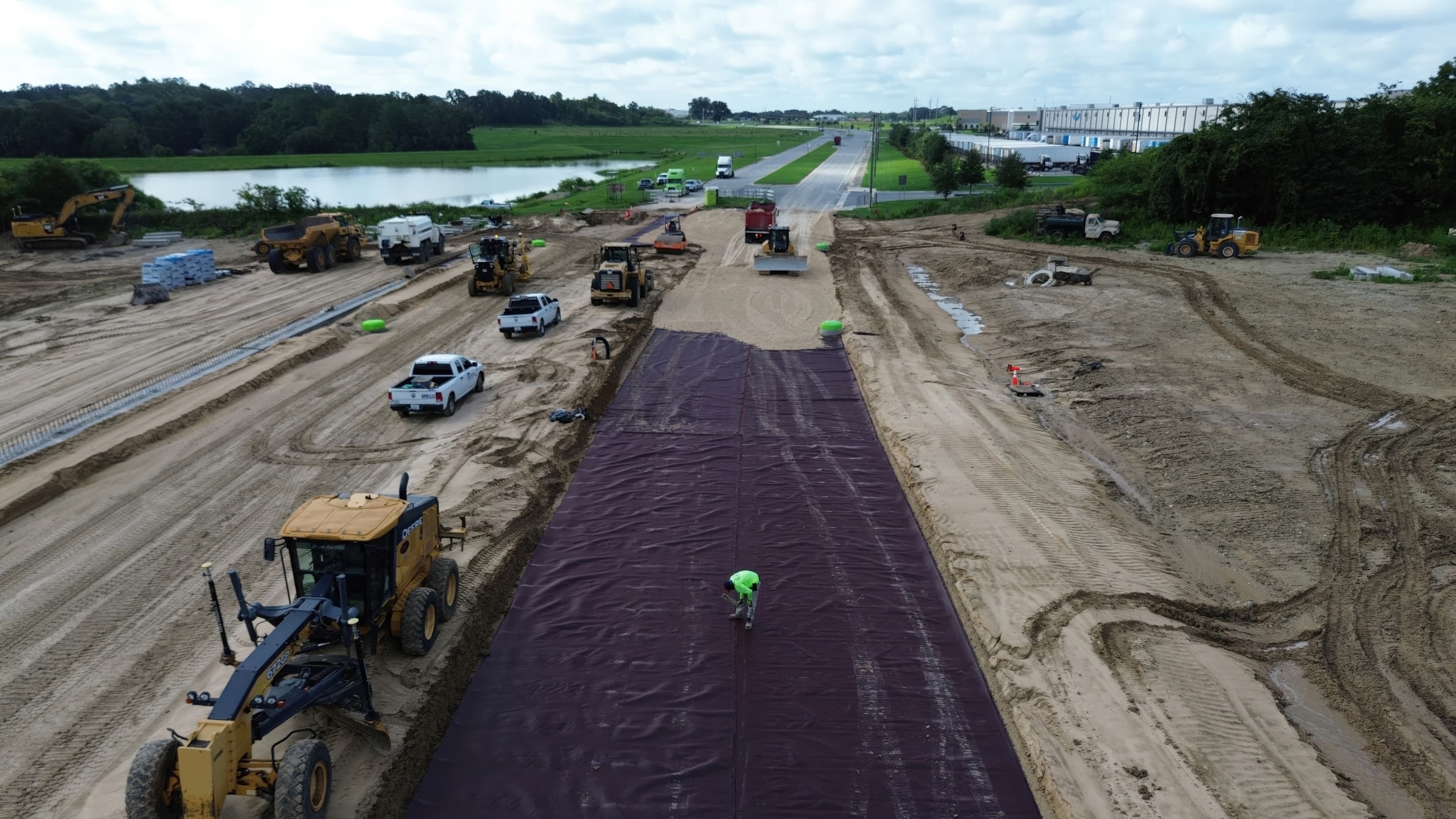 A multi-layer geosynthetic stabilization system was used to address challenges from voids and loose soils.