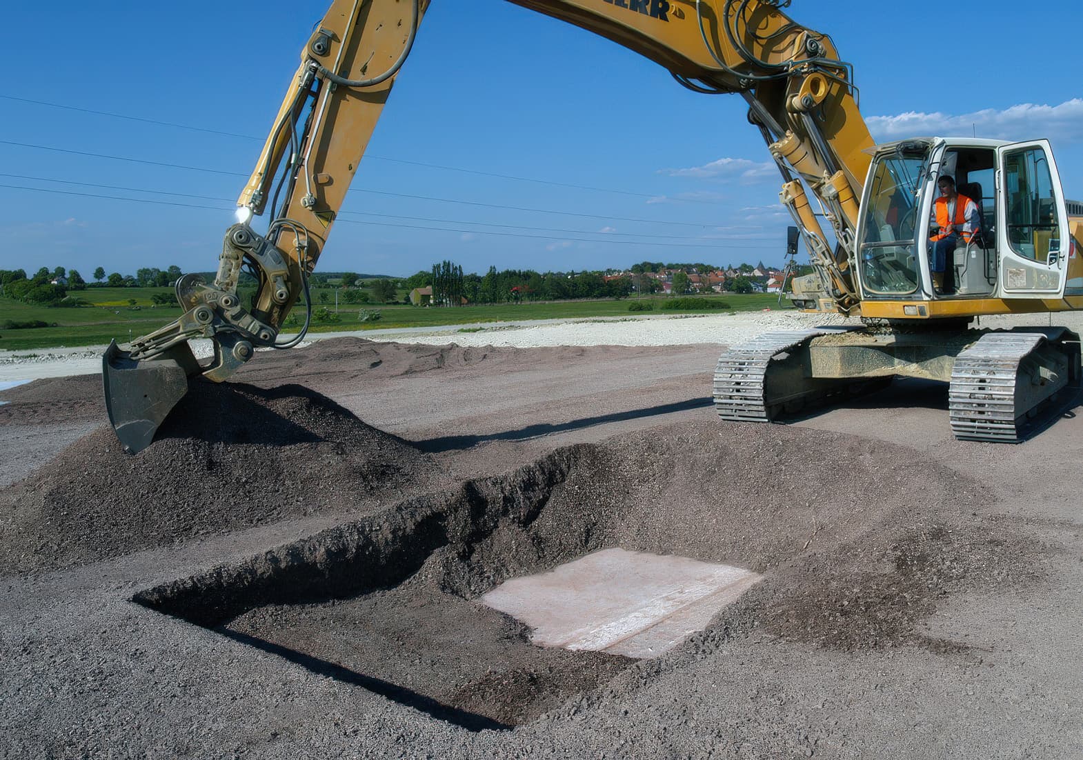 Placing granular protection layer over MIRAFI