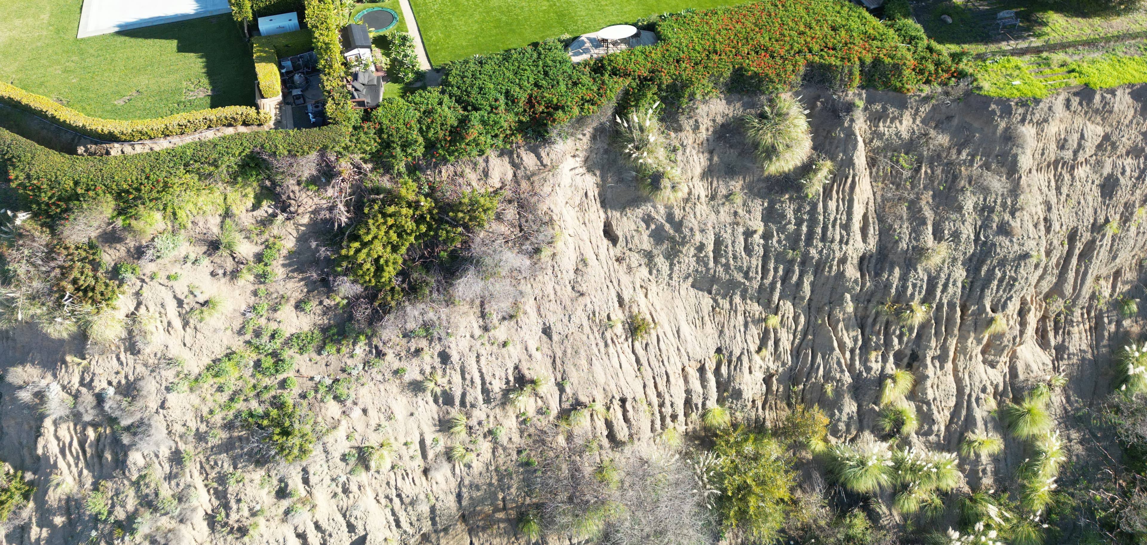 Shows eroded cliffs.