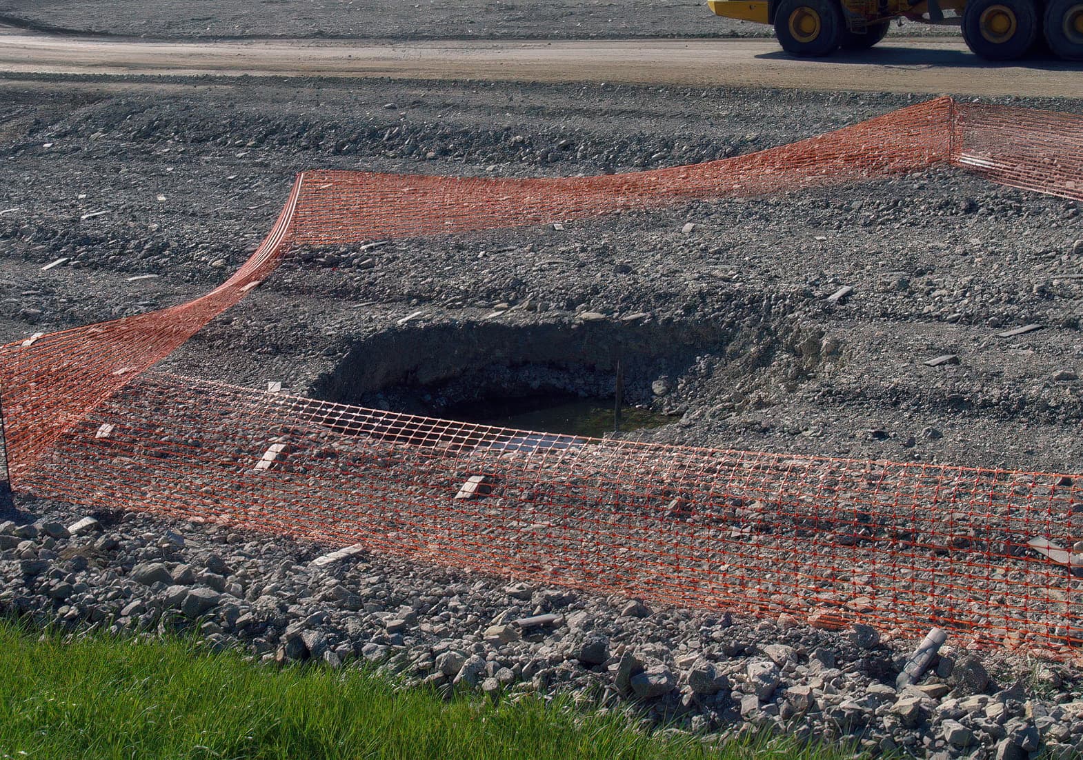 Subsidence found at the base of the railway embankment
