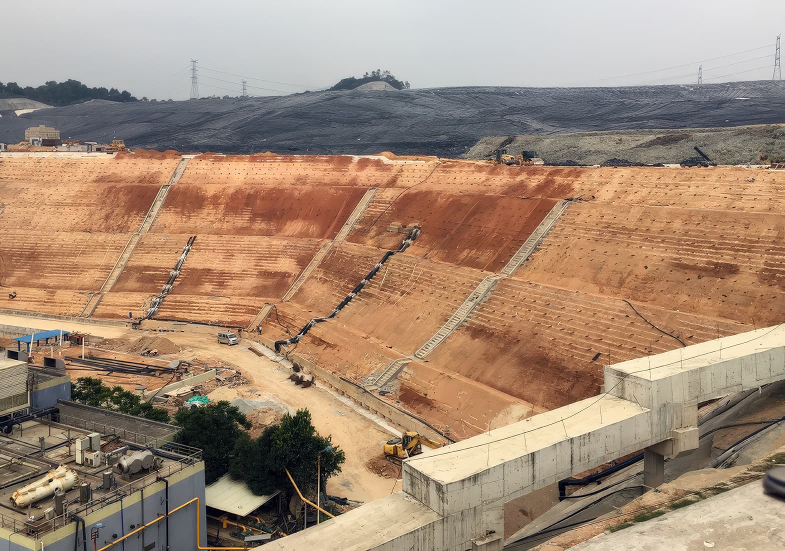 Top soil covering placed on outer slope
