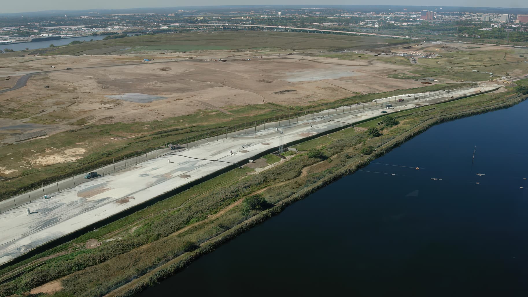 Aerial photo displaying installation of PVD devices to aid in drainage and soil settlement.