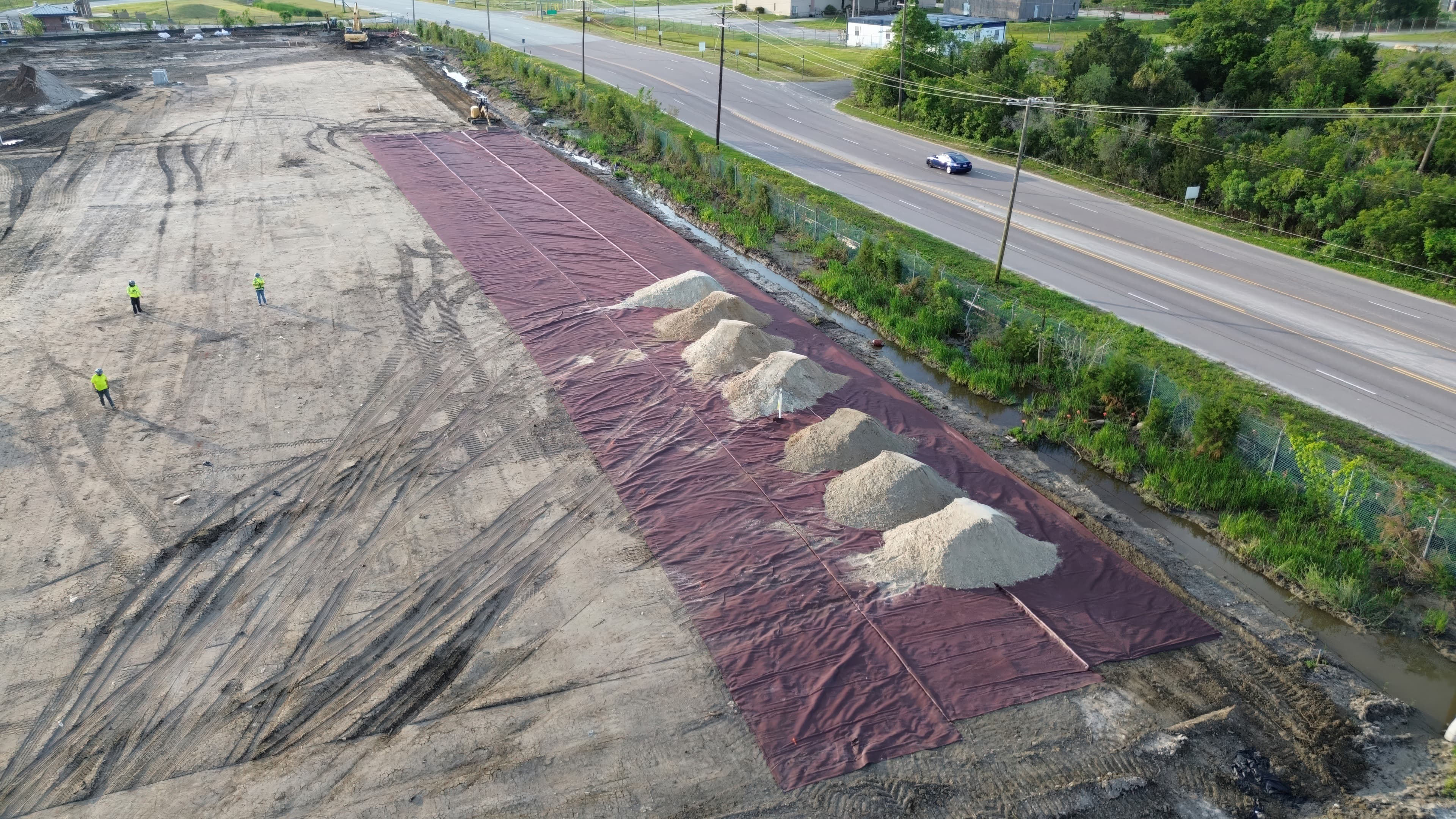 Managing differential settlement on soft landfill soils with MIRAFI