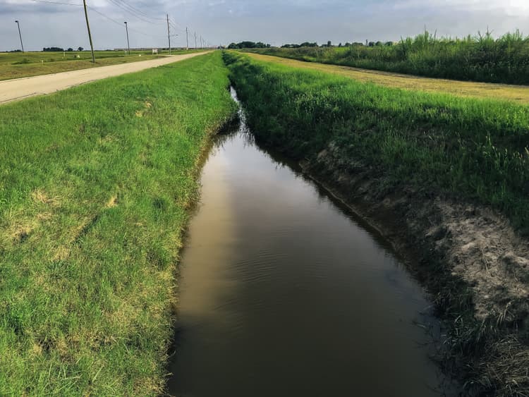 Parallel Ditch System CASE STUDY | Harvey Ditch erosion protection with PROPEX | Solmax